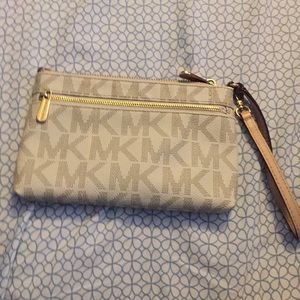 Cream Michael Kors wristlet